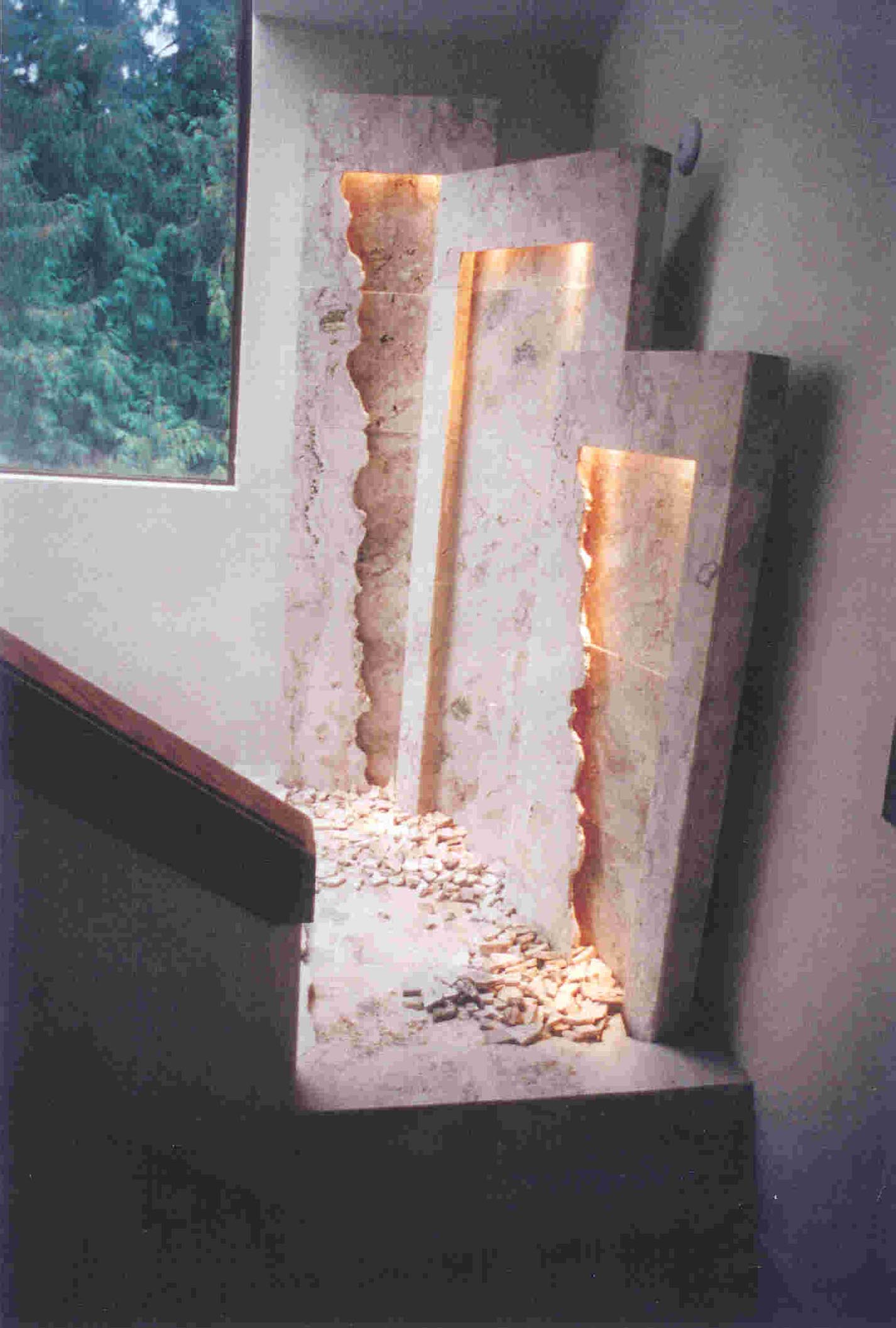 Issaquah WA. Residence three travertine wall presentation over looking an entry- way (18 in x 48 in- 20 inx 54in- 24in x70in lighting in valances all in one basin existing home.